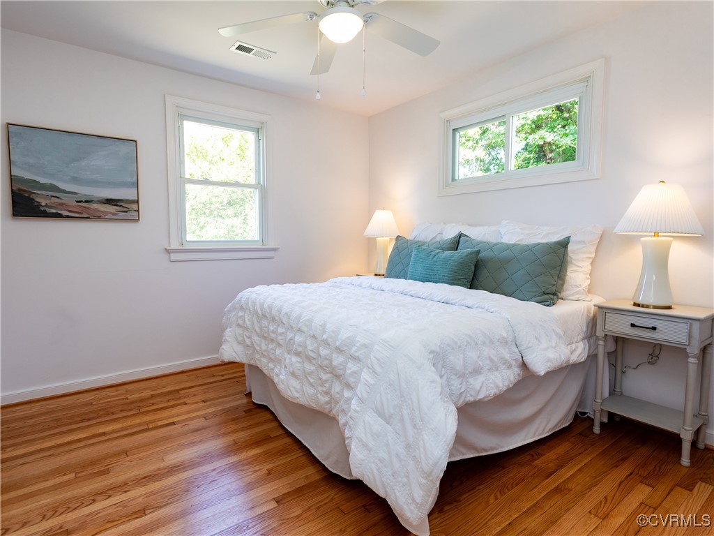 3311 Croydon Road Richmond, VA 23223 - Photo 13 of 23 a bedroom with a bed and a night stand