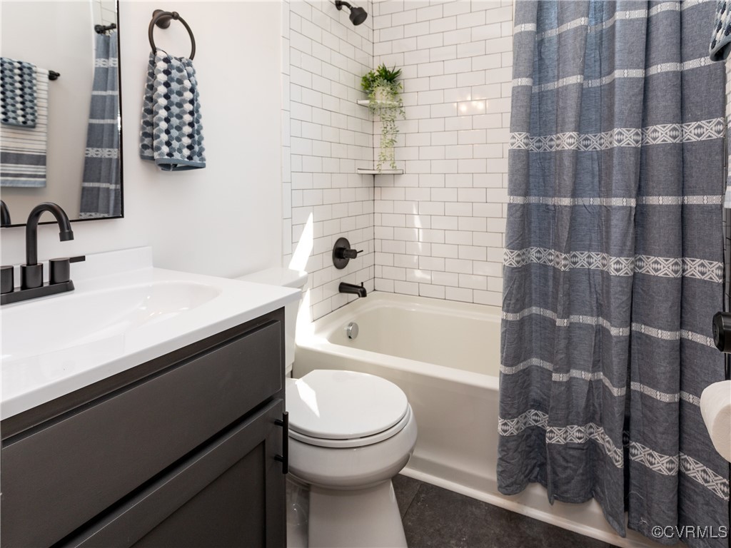 3311 Croydon Road Richmond, VA 23223 - Photo 14 of 23 a bathroom with a sink a toilet and shower