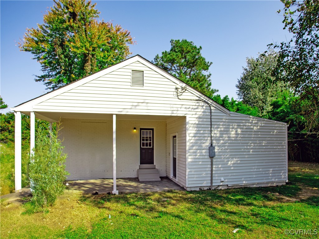 3311 Croydon Road Richmond, VA 23223 - Photo 21 of 23 a view of a house with backyard and garden