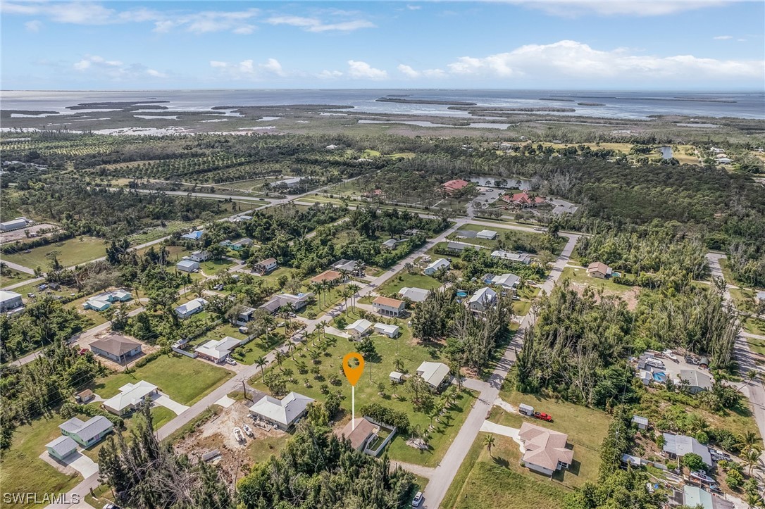 5823 Trout Road Bokeelia, FL 33922 - Photo 29 of 29 an aerial view of residential houses with outdoor space