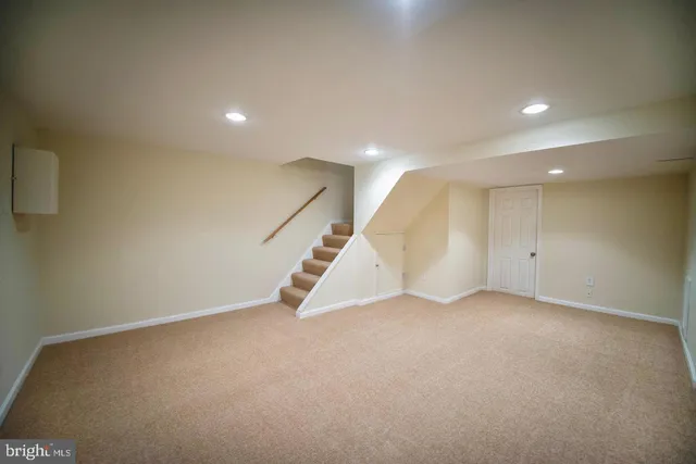 an empty room with white walls and white walls