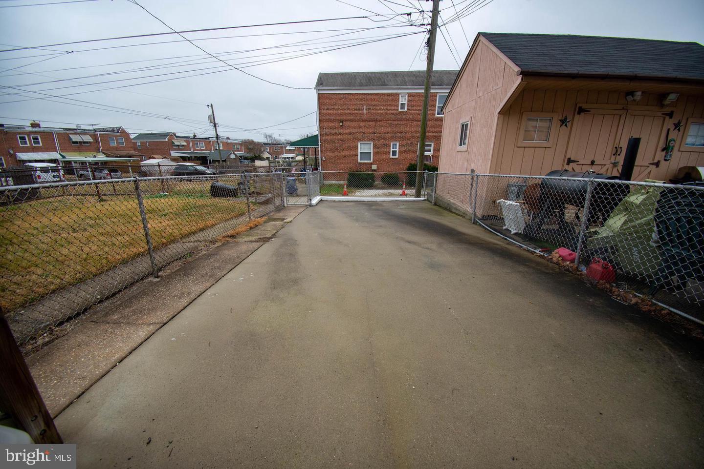 7471 Rabon Avenue Dundalk, MD 21222 - Photo 6 of 6 a view of a balcony with cars parked