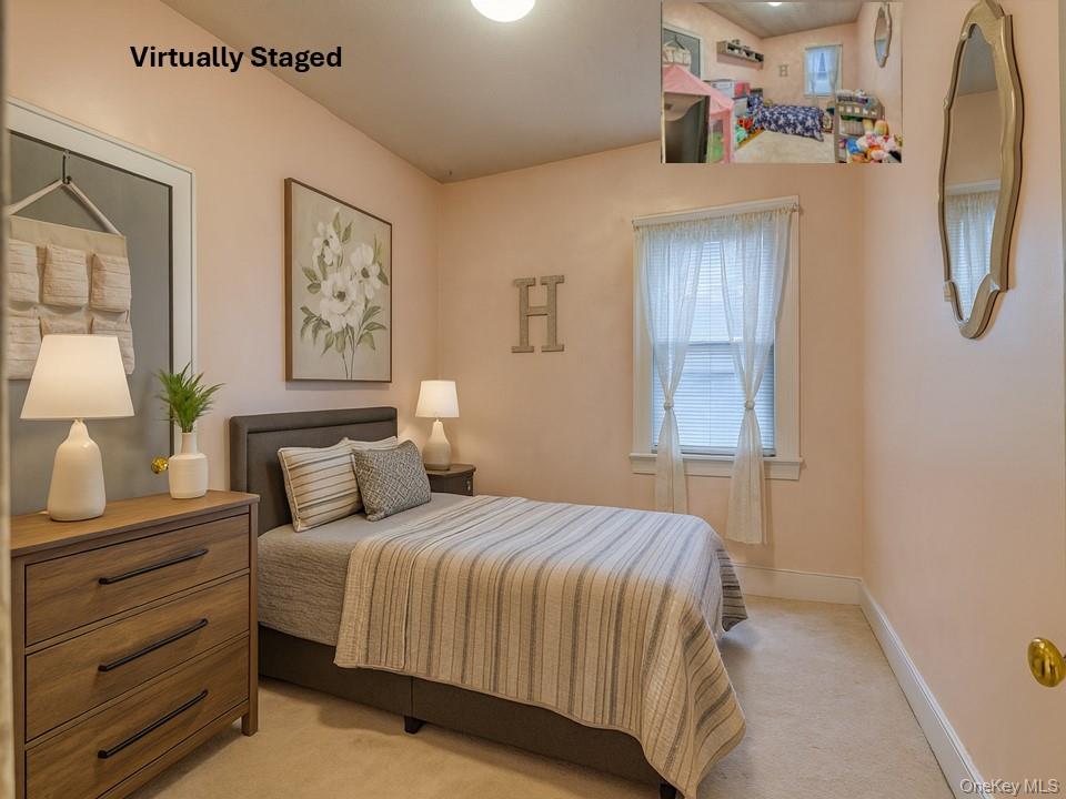 6 Willow Street Newburgh, NY 12550 - Photo 8 of 24 a bedroom with a bed and a window