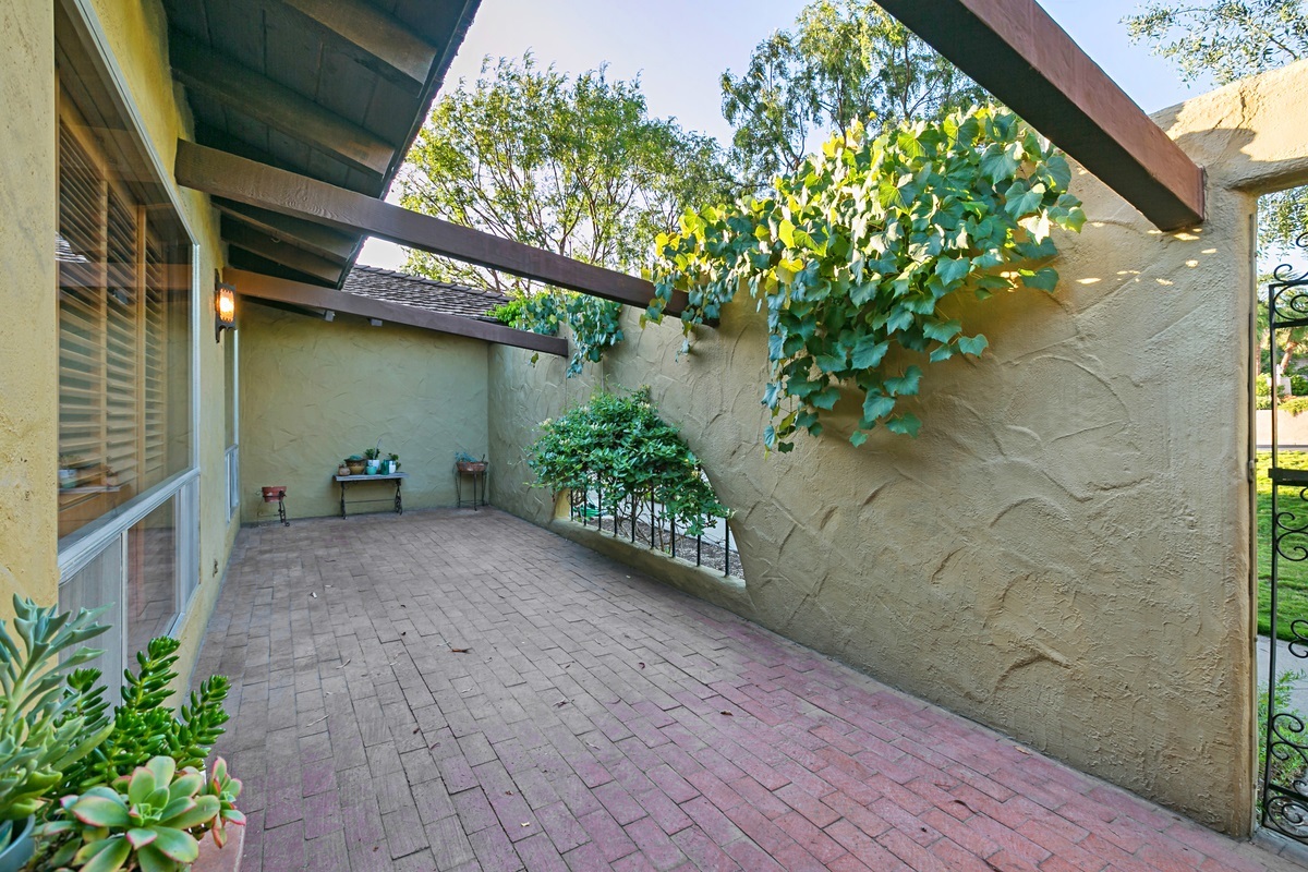 2147 Windmill View Road El Cajon, CA 92020 - Photo 5 of 25 Front patio private and grape vines
