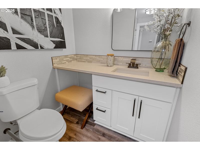 2868 Southwest 196th Avenue Beaverton, OR 97003 - Photo 21 of 34 a bathroom with a toilet sink and mirror