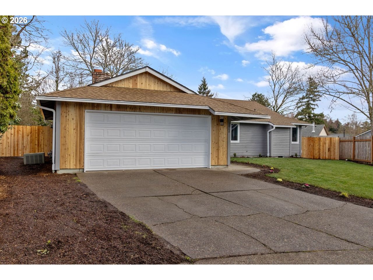 2868 Southwest 196th Avenue Beaverton, OR 97003 - Photo 3 of 34 a view of a house with a yard