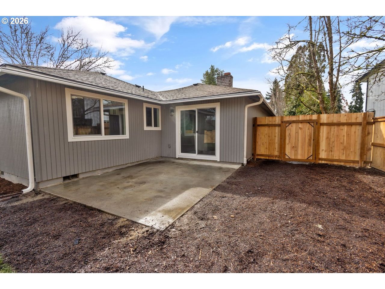 2868 Southwest 196th Avenue Beaverton, OR 97003 - Photo 4 of 34 a view of a house with a backyard