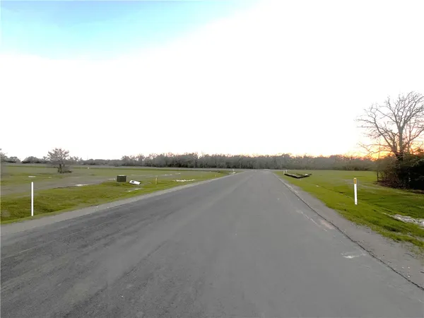 a view of a lake with a big yard