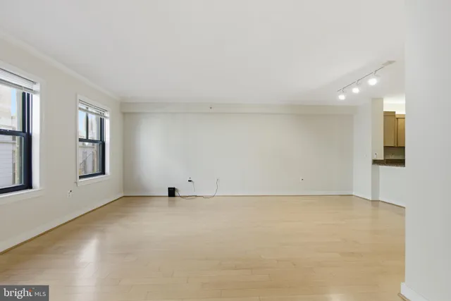 an empty room with windows