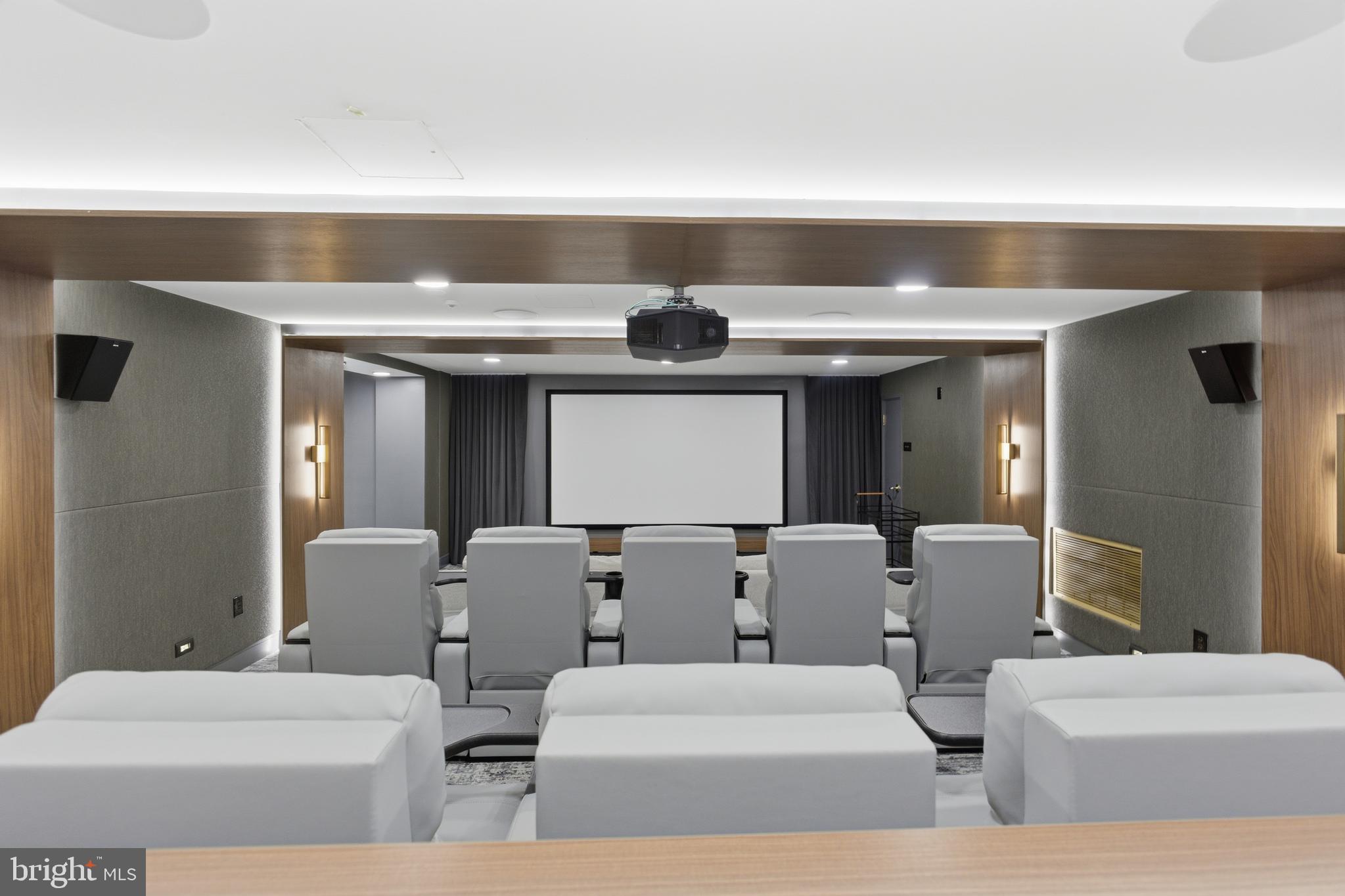 616 E Street Northwest, Unit 419 Washington, DC 20004 - Photo 21 of 30 a living room with couches and painted walls