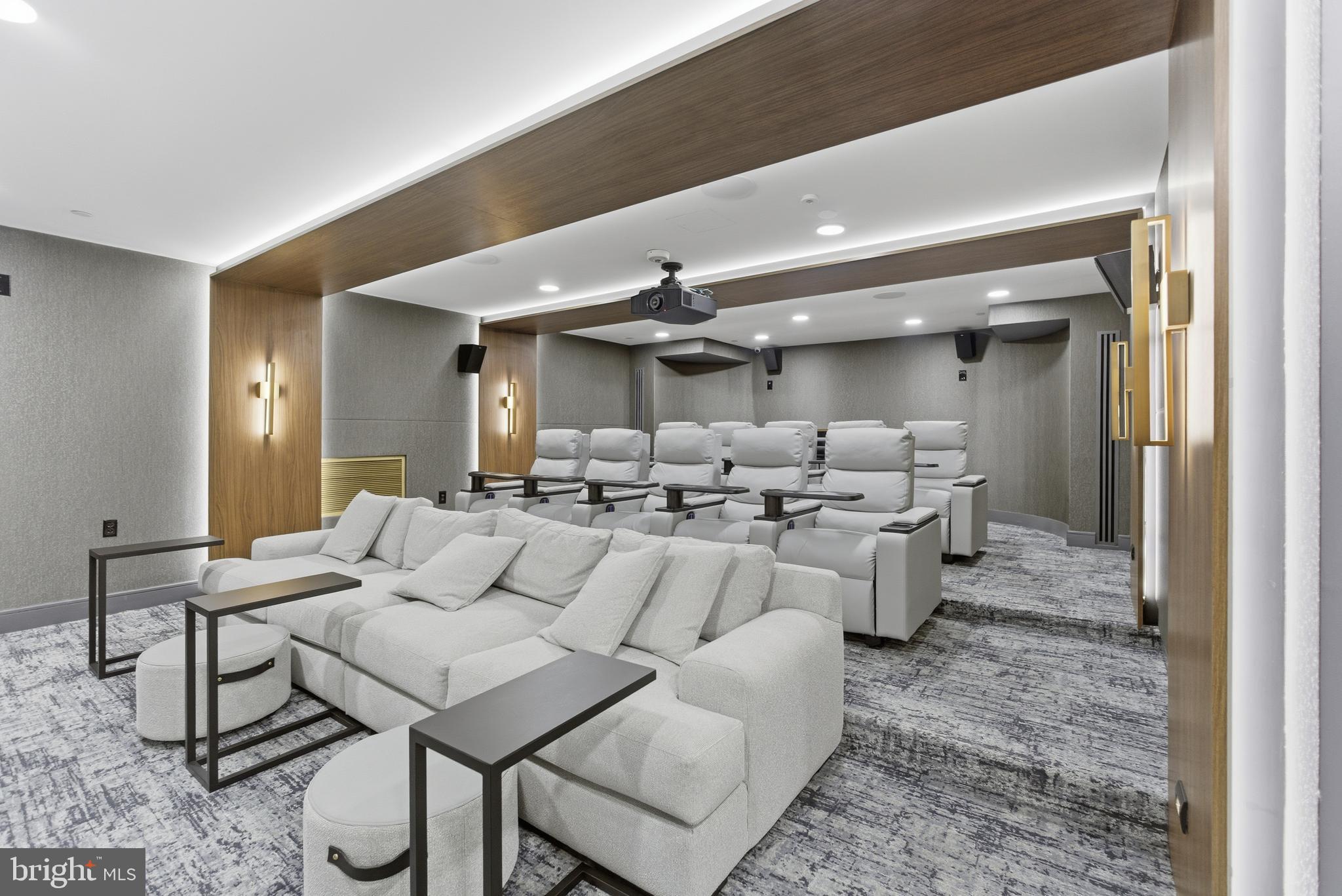 616 E Street Northwest, Unit 419 Washington, DC 20004 - Photo 22 of 30 a living room with furniture and a rug