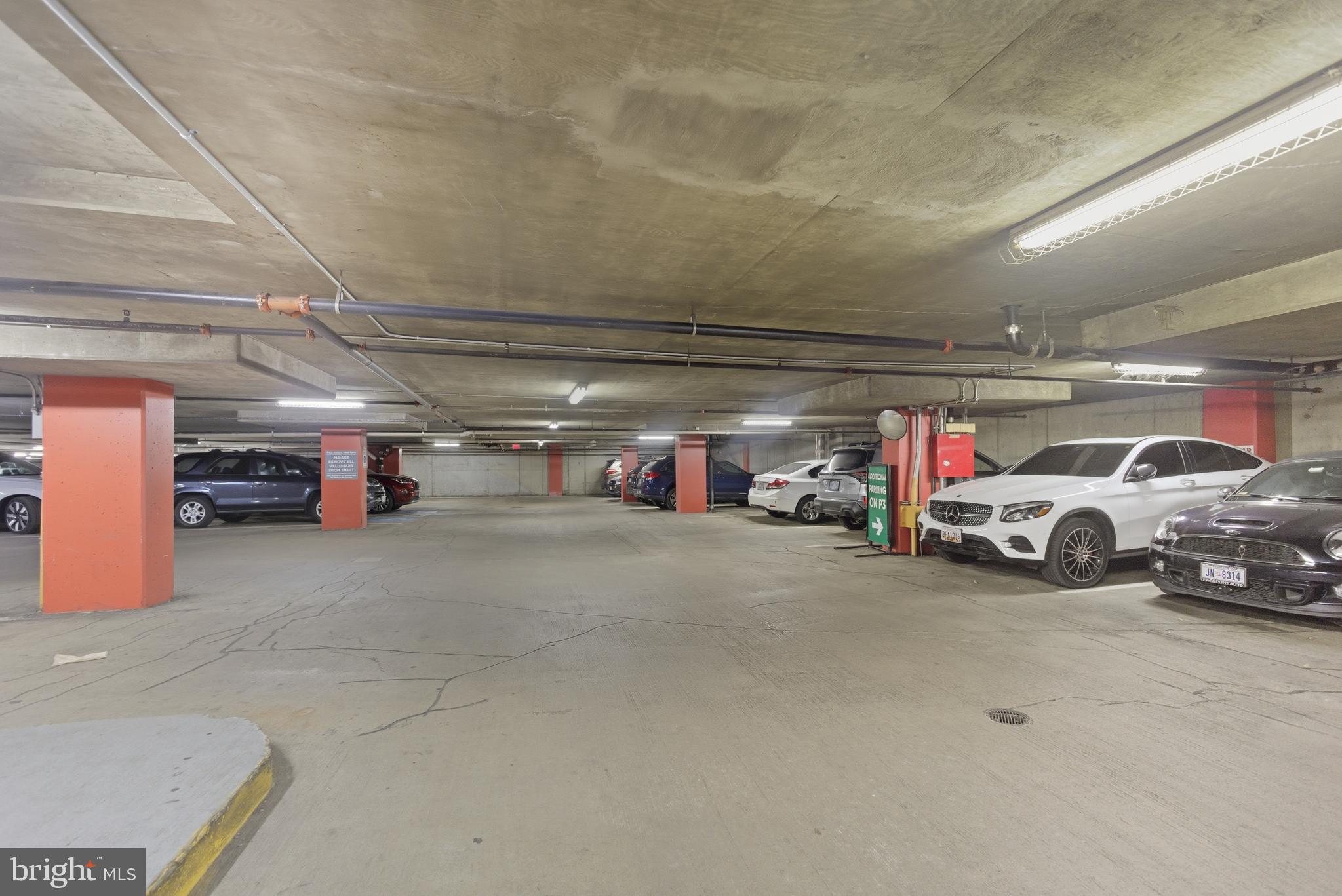 616 E Street Northwest, Unit 419 Washington, DC 20004 - Photo 30 of 30 a view of parking garage with cars and other equipment