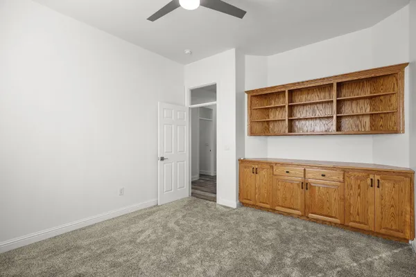 an empty room with cabinet