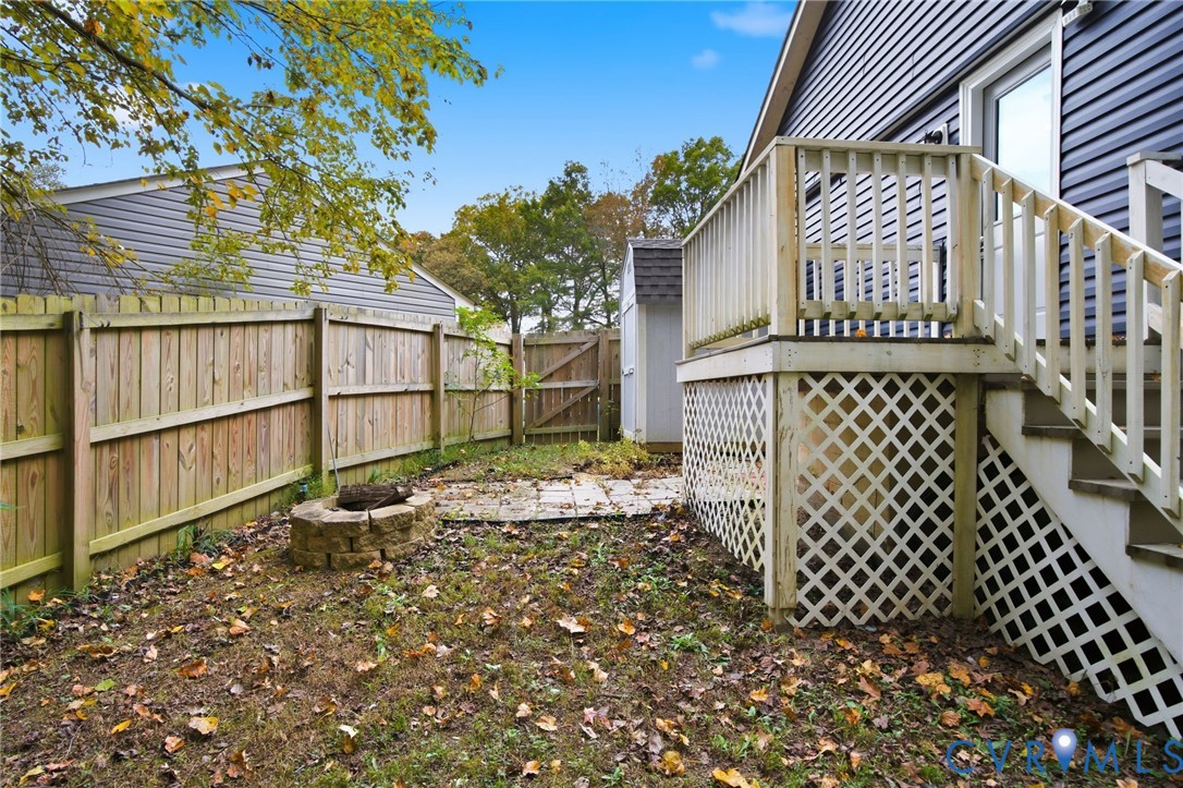 1802 Freeman Street Hopewell, VA 23860 - Photo 18 of 20 a backyard of a house with wooden fence