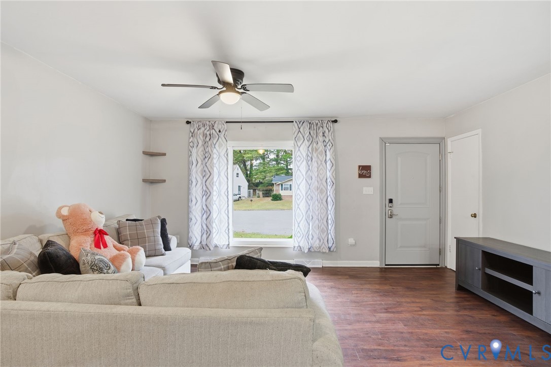 1802 Freeman Street Hopewell, VA 23860 - Photo 3 of 20 a living room with furniture and a window