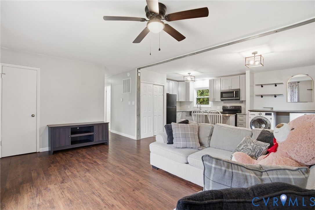 1802 Freeman Street Hopewell, VA 23860 - Photo 4 of 20 a living room with furniture and wooden floor
