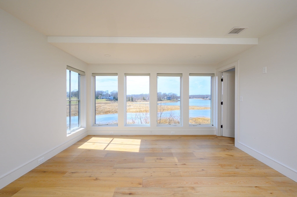 10 Chestnut Place Hingham, MA 02043 - Photo 13 of 32 a view of an empty room with a window