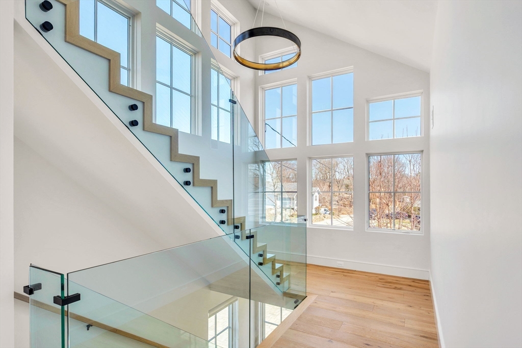 10 Chestnut Place Hingham, MA 02043 - Photo 16 of 32 a view of an entryway with staircase