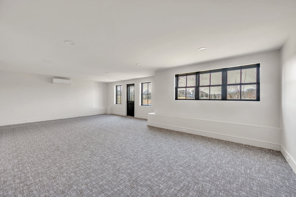 10 Chestnut Place Hingham, MA 02043 - Photo 24 of 32 a view of a big room with windows and closet