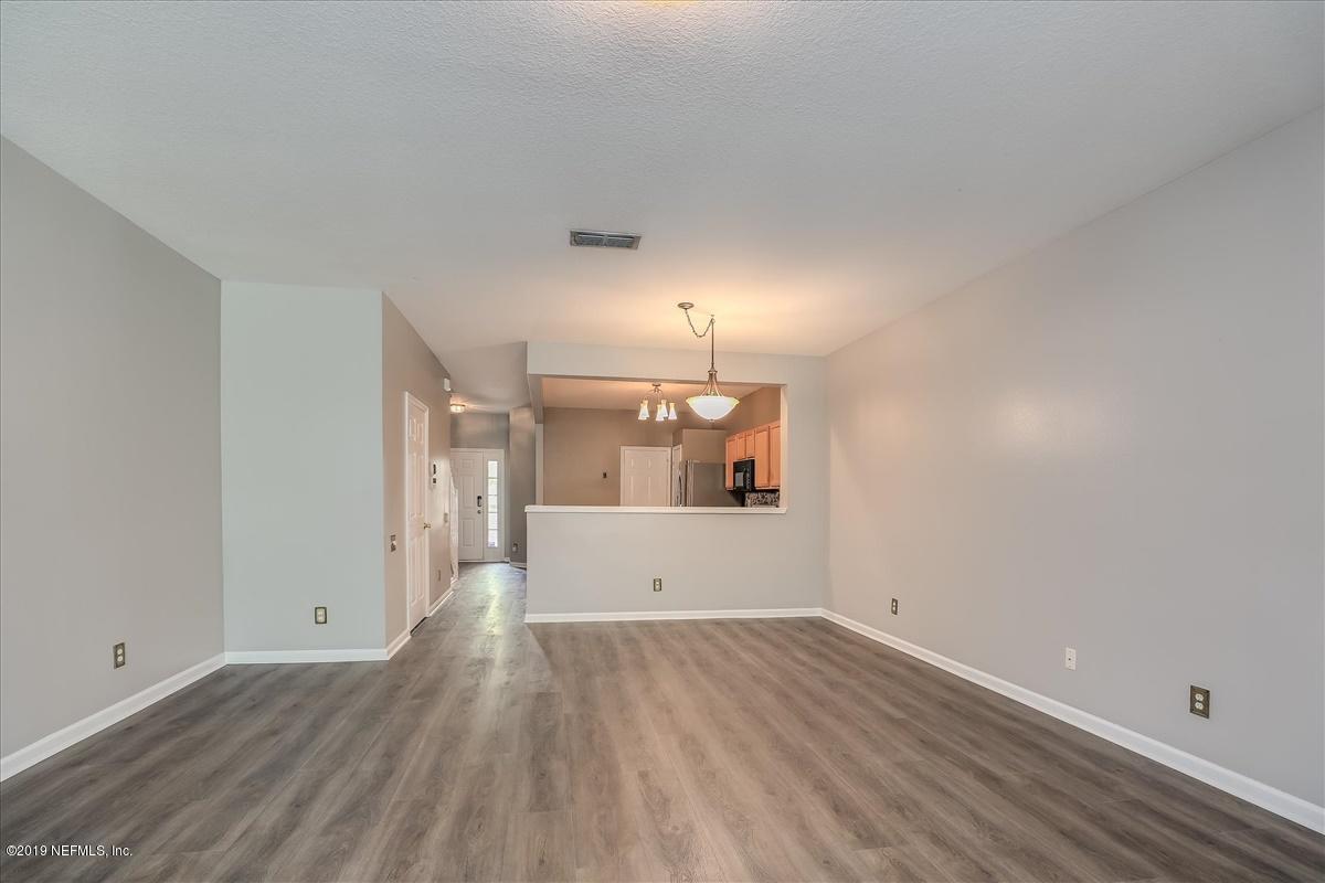 7990 Baymeadows Road, Unit 2106 Jacksonville, FL 32256 - Photo 4 of 17 03-Dining Room to Kitchen