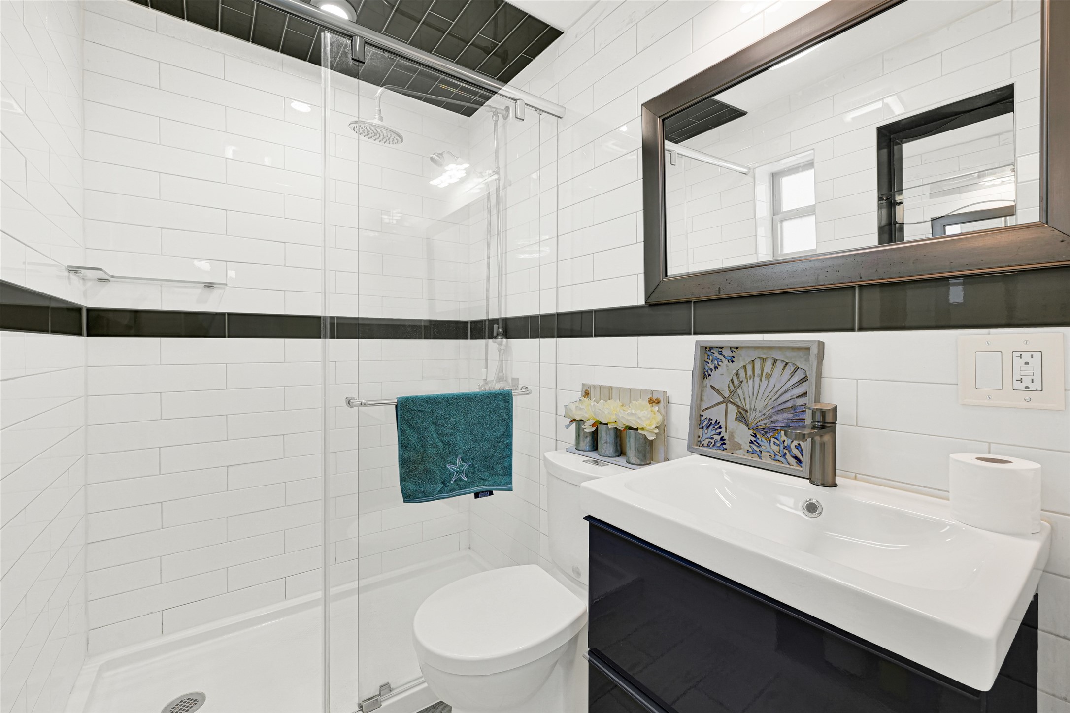 1603 Welch Street, Unit 8 Houston, TX 77006 - Photo 19 of 21 a bathroom with a sink a toilet and shower