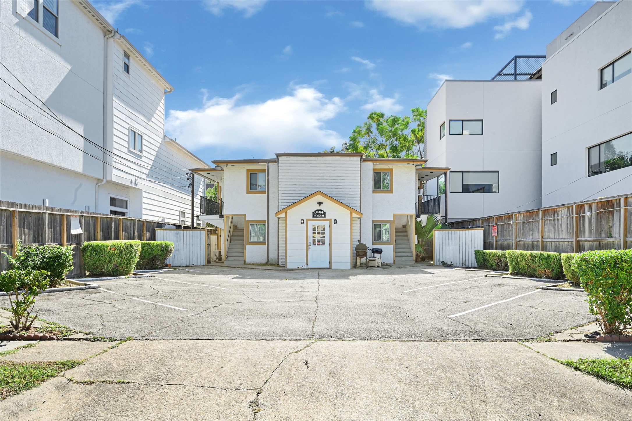 1603 Welch Street, Unit 8 Houston, TX 77006 - Photo 3 of 21 a view of a house with a outdoor space