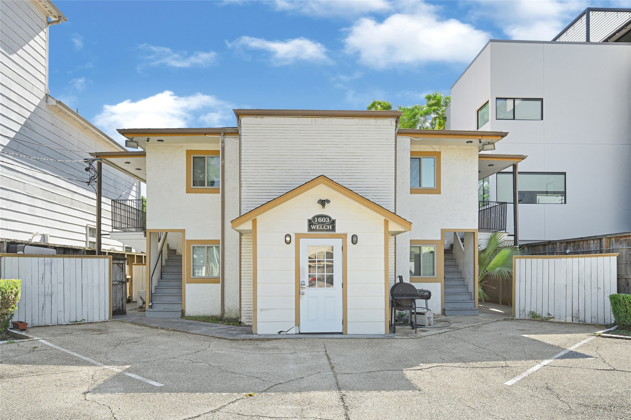 1603 Welch Street, Unit 8 Houston, TX 77006 - Photo 6 of 21 a view of a house with a garage