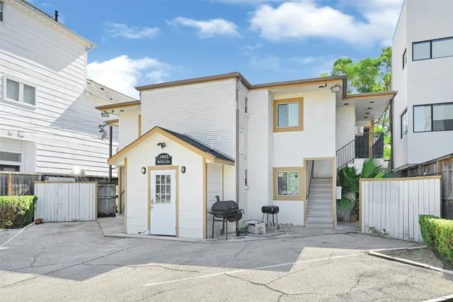 a front view of a house with a garage