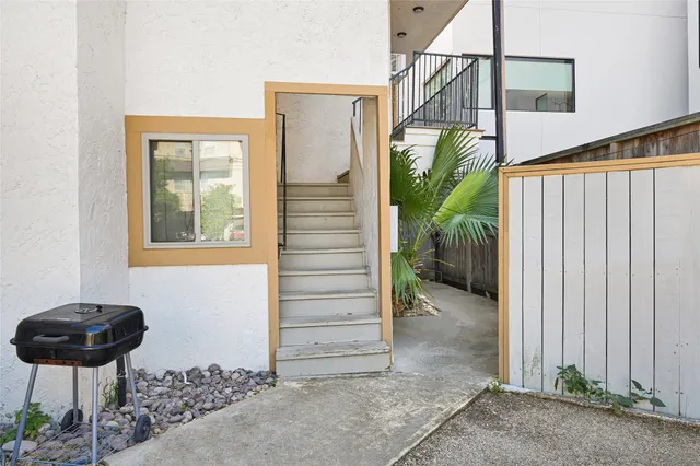 a view of a porch with seating space
