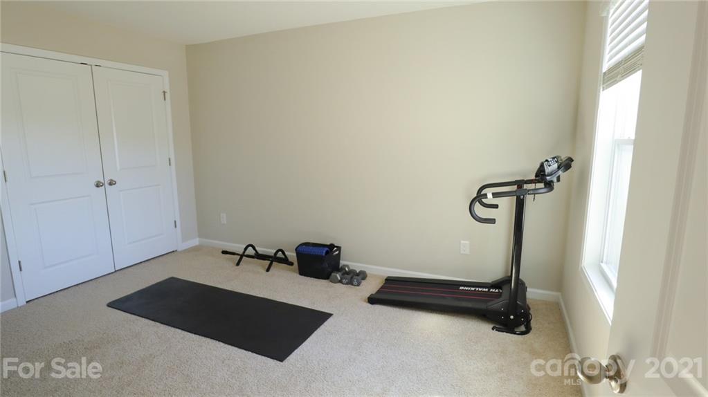 1437 Bramblewood Drive Fort Mill, SC 29708 - Photo 20 of 22 a view of a room with gym equipment