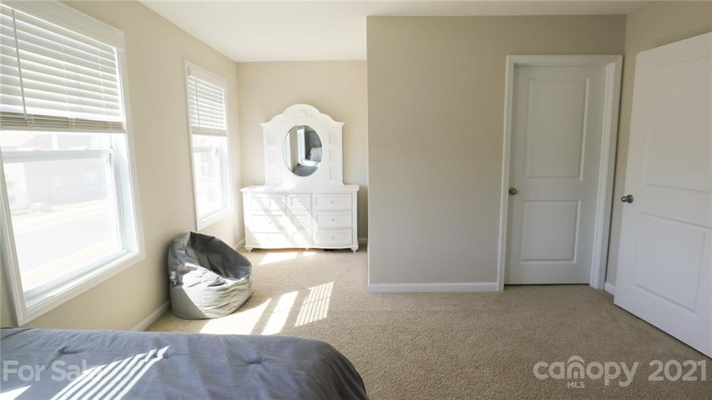 1437 Bramblewood Drive Fort Mill, SC 29708 - Photo 22 of 22 a bedroom with a bed and a window