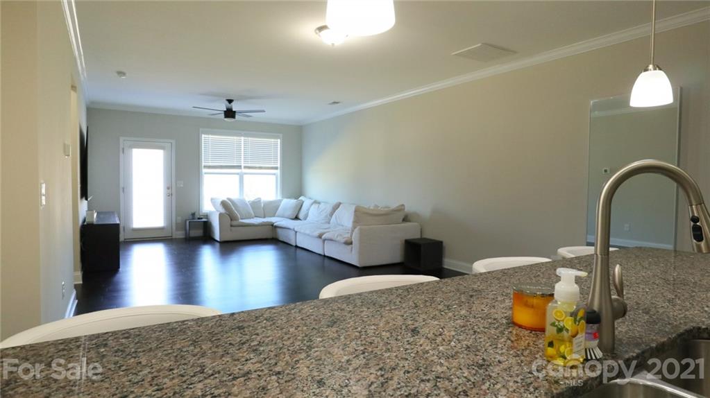 1437 Bramblewood Drive Fort Mill, SC 29708 - Photo 7 of 22 a kitchen with a sink and a view of living room