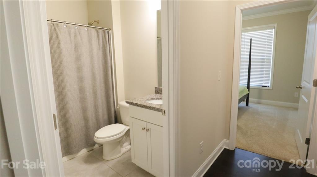 1437 Bramblewood Drive Fort Mill, SC 29708 - Photo 10 of 22 a bathroom with a toilet and a shower