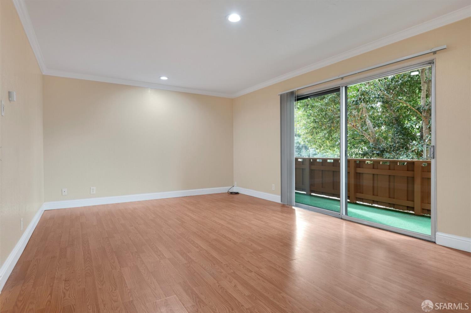 1736 Woodland Avenue Palo Alto, CA 94301 - Photo 3 of 17 a view of empty room with wooden floor and floor