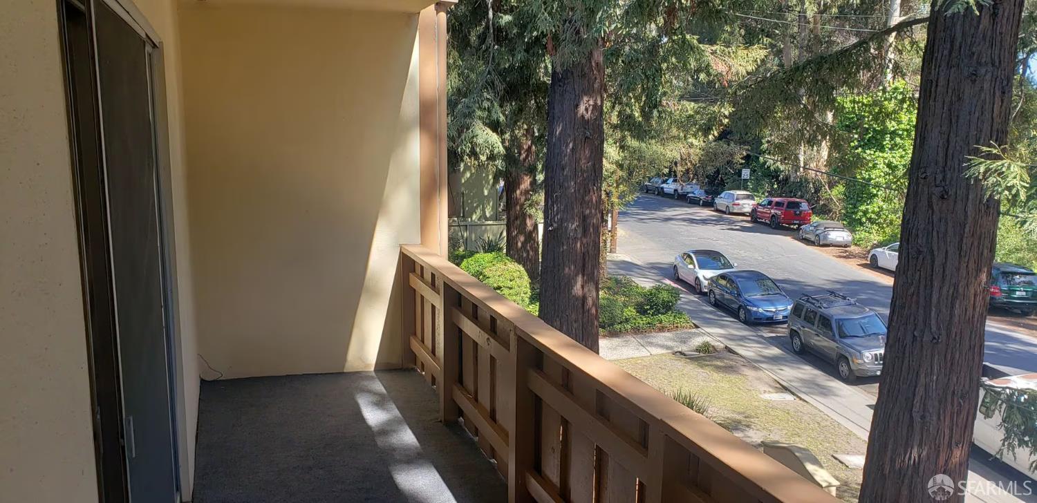 1736 Woodland Avenue Palo Alto, CA 94301 - Photo 9 of 17 a view of a balcony with trees