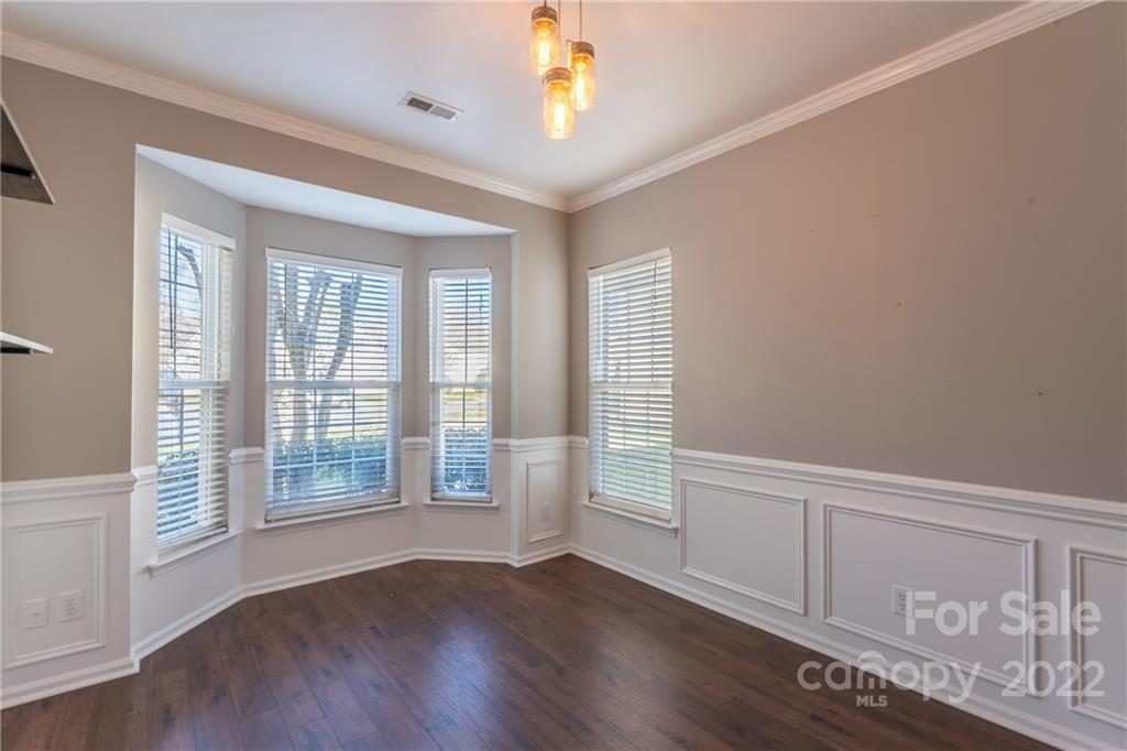3941 Caliper Place Fort Mill, SC 29708 - Photo 12 of 46 wooden floor in an empty room with a window