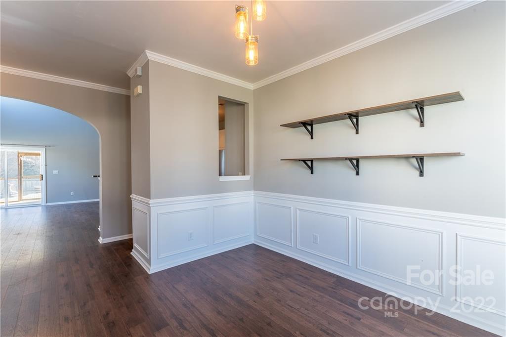 3941 Caliper Place Fort Mill, SC 29708 - Photo 13 of 46 a view of an empty room with window and wooden floor
