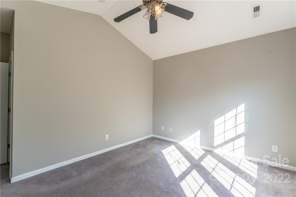 3941 Caliper Place Fort Mill, SC 29708 - Photo 15 of 46 a view of empty room with window and wooden floor