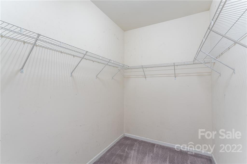 3941 Caliper Place Fort Mill, SC 29708 - Photo 17 of 46 a view of a room with racks on the wall