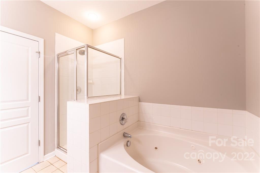 3941 Caliper Place Fort Mill, SC 29708 - Photo 20 of 46 a bathroom with a bathtub