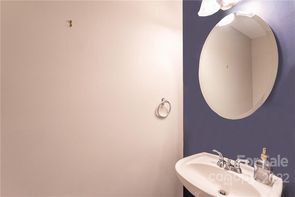 3941 Caliper Place Fort Mill, SC 29708 - Photo 24 of 46 a bathroom with a sink and mirror