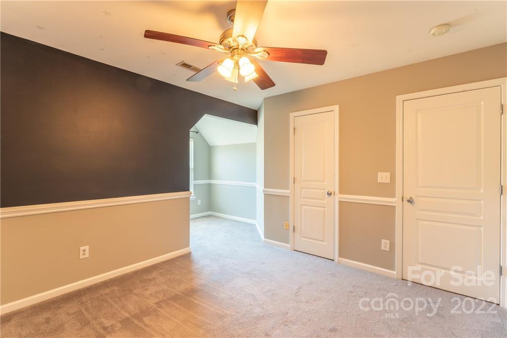 3941 Caliper Place Fort Mill, SC 29708 - Photo 25 of 46 an empty room with closet and windows