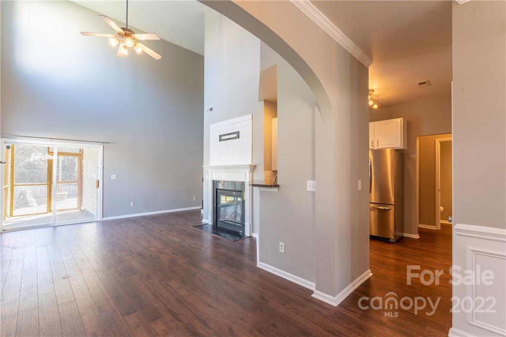 3941 Caliper Place Fort Mill, SC 29708 - Photo 3 of 46 wooden floor in an empty room with a window