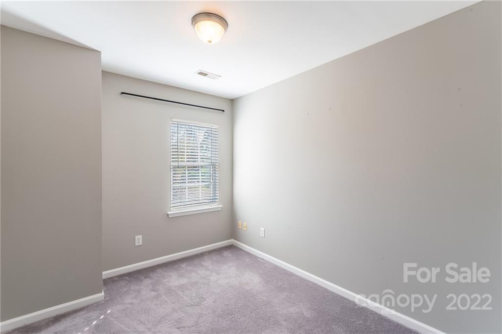 3941 Caliper Place Fort Mill, SC 29708 - Photo 33 of 46 a view of an empty room with a window