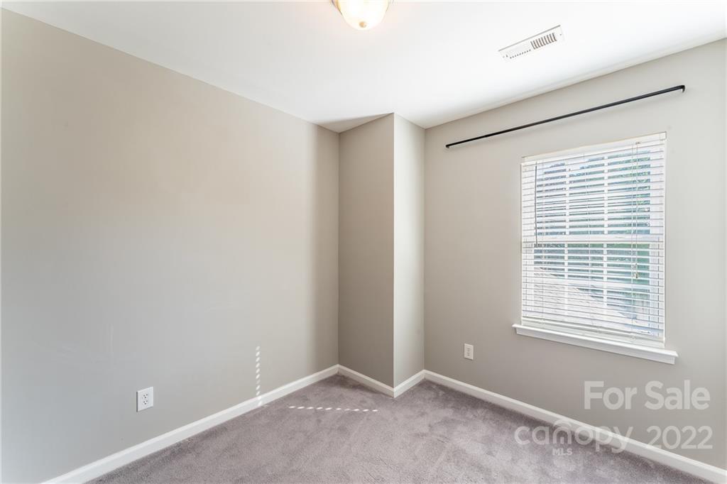 3941 Caliper Place Fort Mill, SC 29708 - Photo 35 of 46 a view of an empty room with a window
