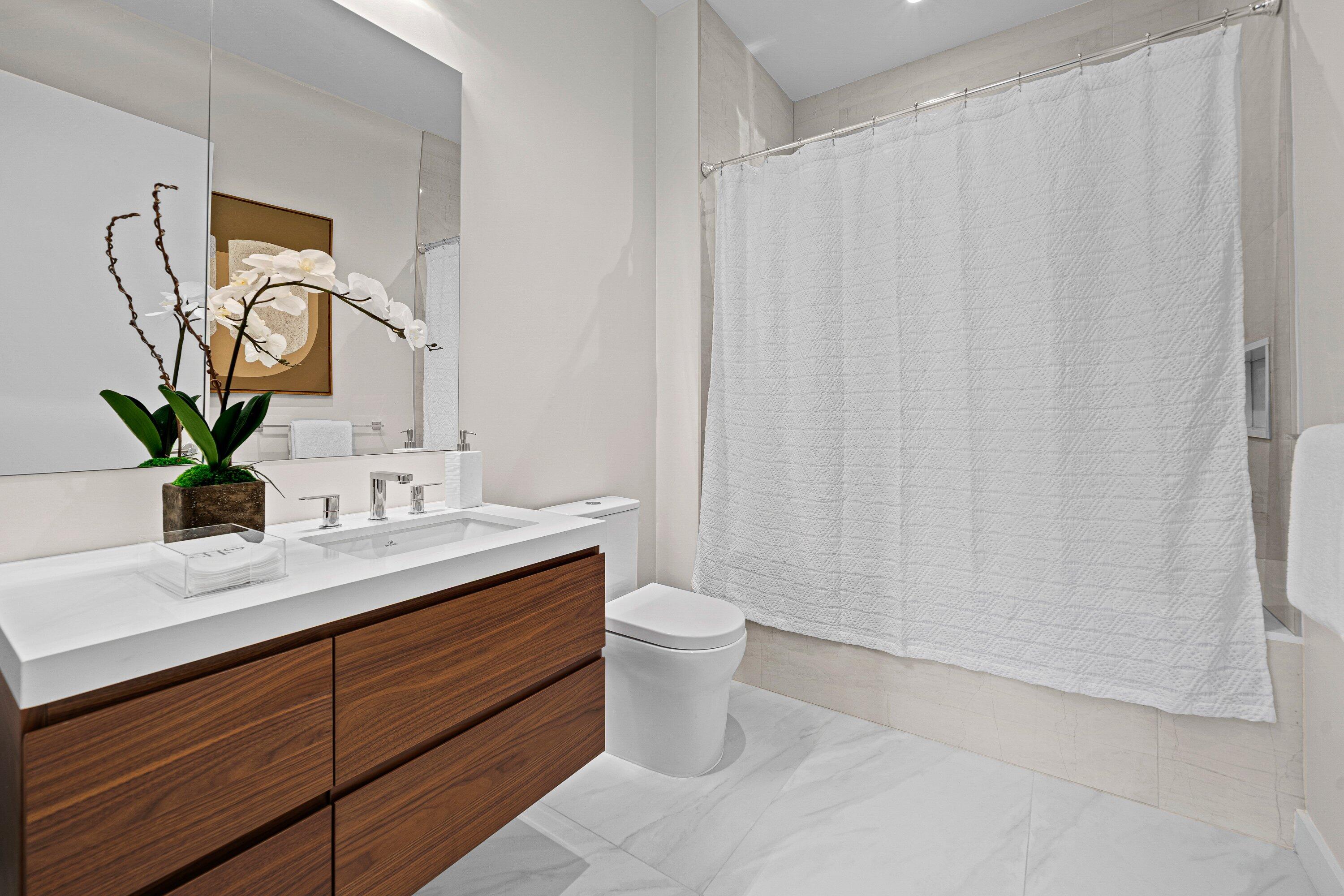 220 Southeast Mizner Boulevard, Unit 102 Boca Raton, FL 33432 - Photo 21 of 55 2nd Bathroom