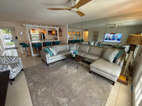 a bedroom with bed and a window