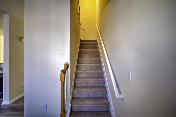 a view of entryway with wooden floor