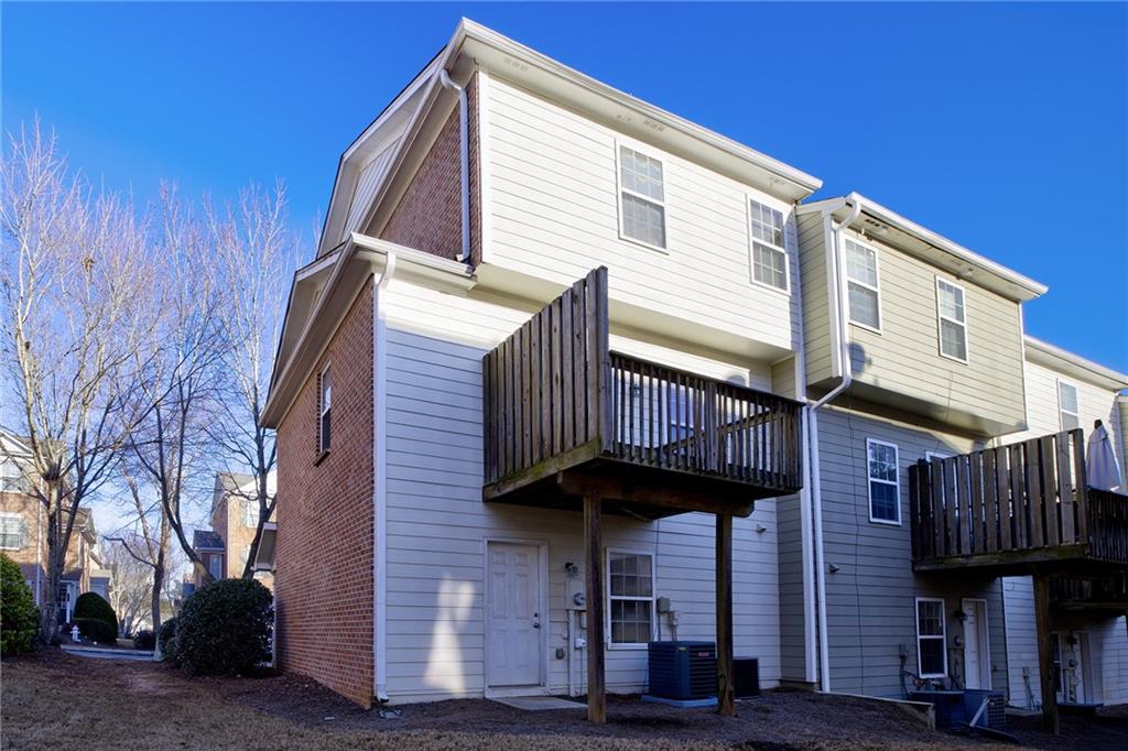 2247 Landing Ridge Drive Duluth, GA 30097 - Photo 24 of 24 a view of a house with wooden fence