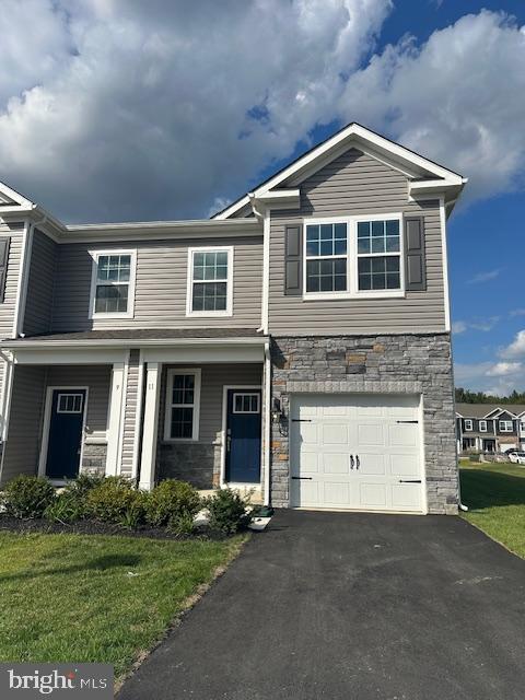 11 Anna Lane Westampton, NJ 08060 - Photo 1 of 28 a front view of a house with a yard and garage